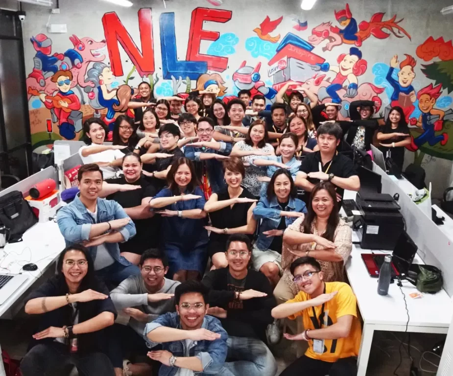 TeamAsia celebrating Women’s Month by showing a sign of solidarity for equality